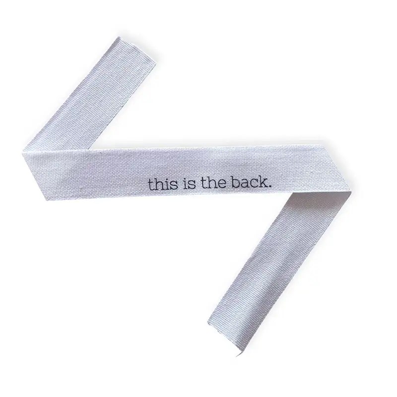 Baumwoll-Halsnaht-Band mit der Aufschrift this is back