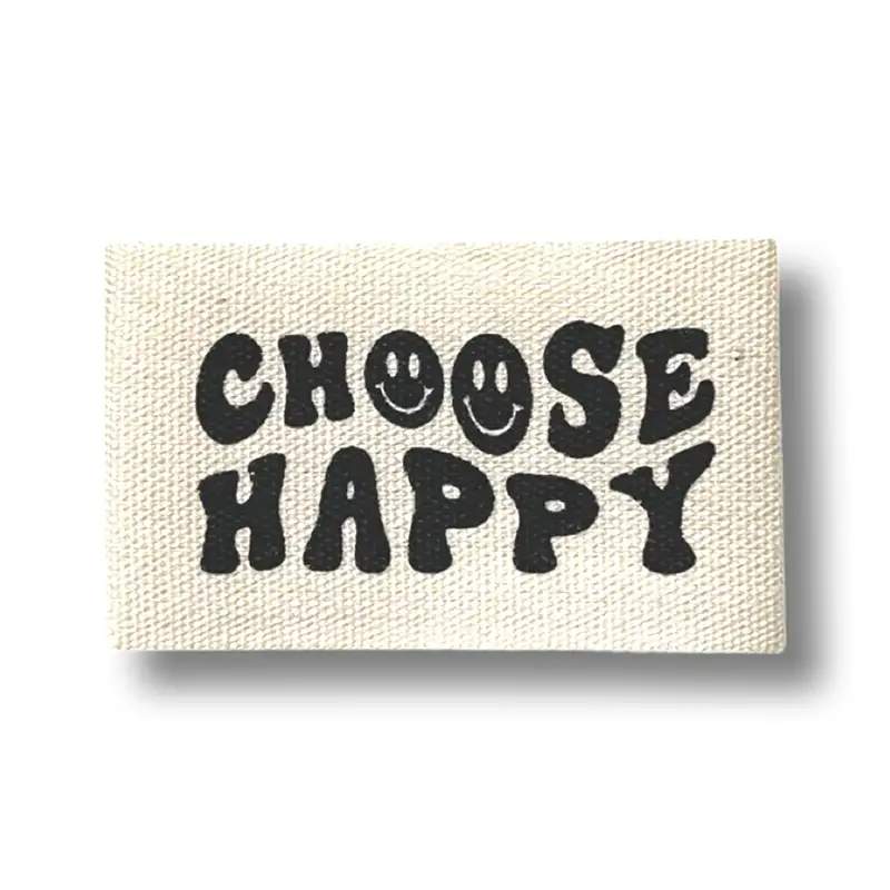 Baumwoll-Label mit Aufschrift "Choose happy"