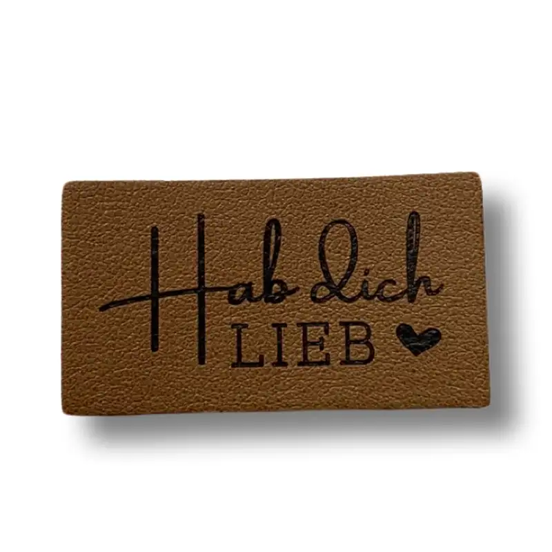 echteckiger Aufnäher aus Kunstleder mit der Aufschrift " Hab dich lieb"