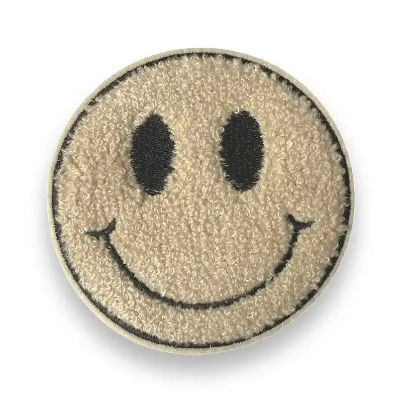 Loop Patch in Form eines Smileys in der Farbe beige. Größe: 100 mm x 100 mm