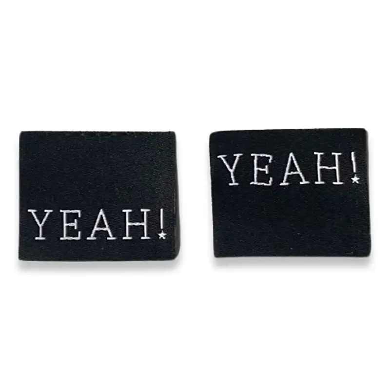 Weblabels in schwarz mit weißer Aufschrift "YEAH