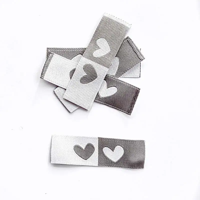 Weblabels grau und weiß mit Aufdruck Herz