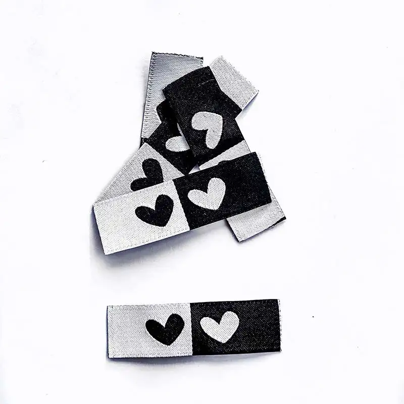 Weblabels schwarz und weiß mit Aufdruck Stern