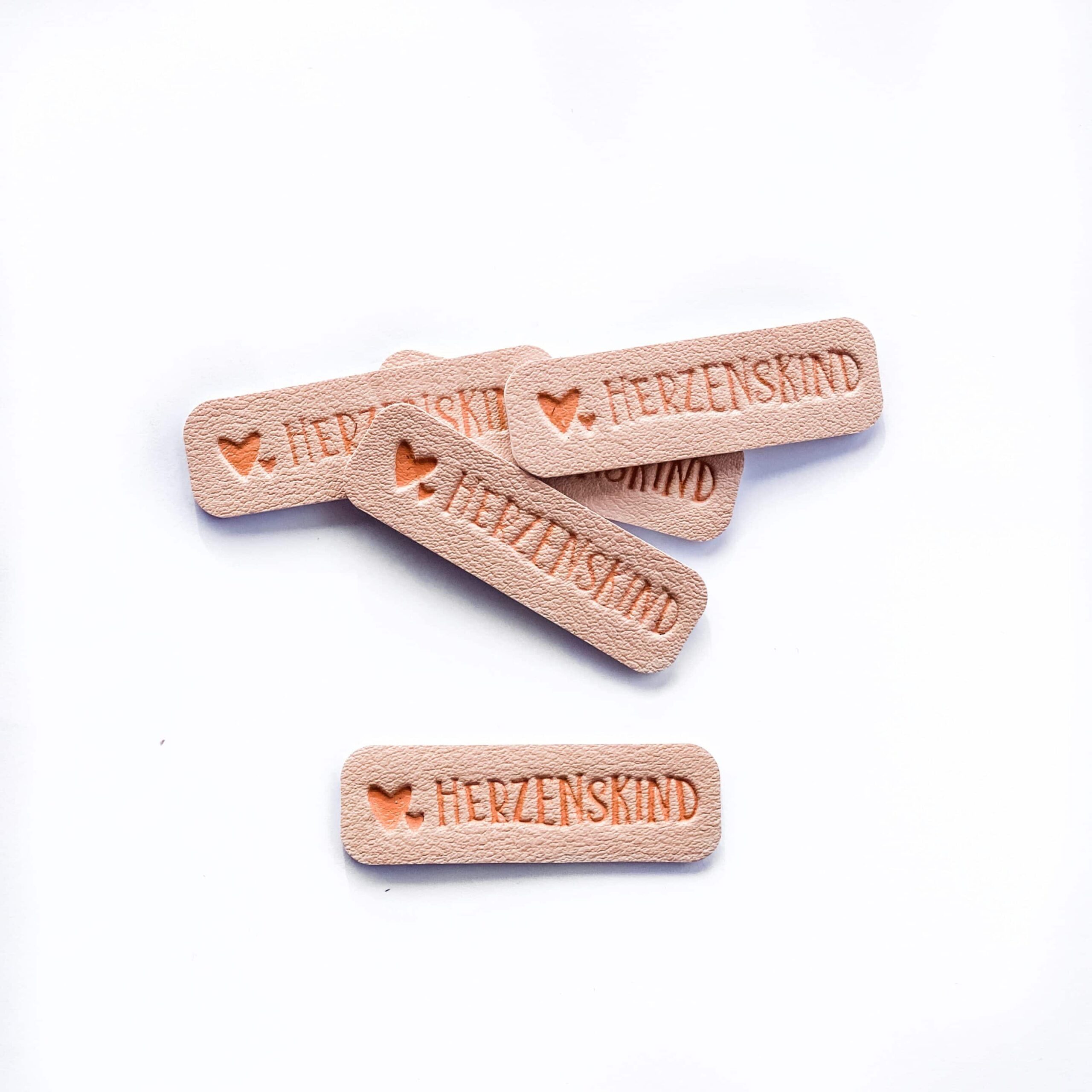Kunstlederlabels "Herzenskind" rosa 5Stk.