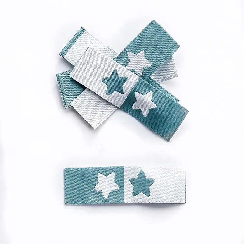 Weblabels petrol und weiß mit Aufdruck Stern